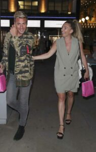 Candice Brown in a Grey Suit