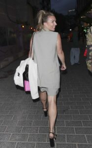 Candice Brown in a Grey Suit