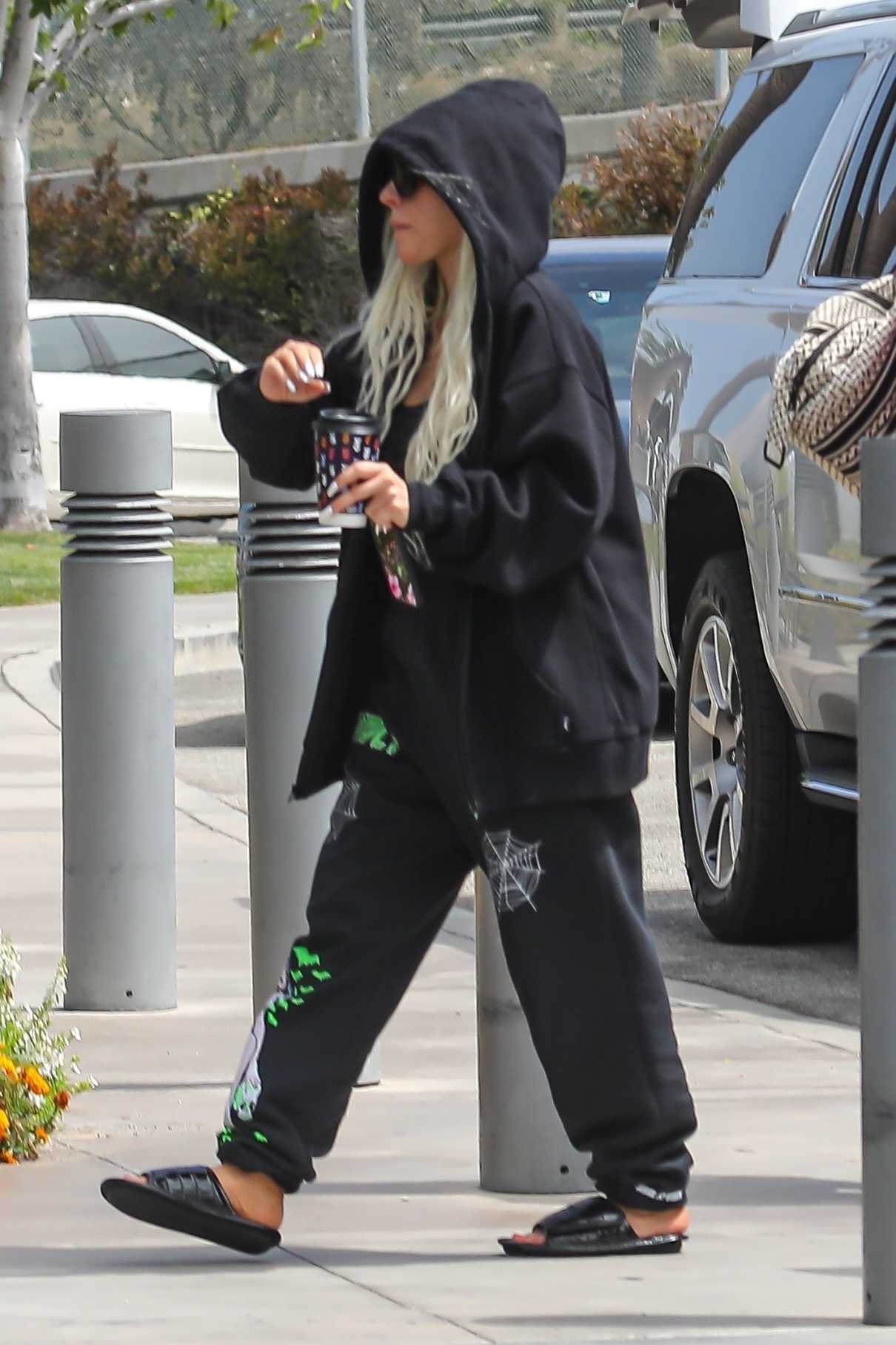 Christina Aguilera in a Black Sweatsuit