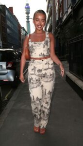 Harley Brash in a White Patterned Ensemble