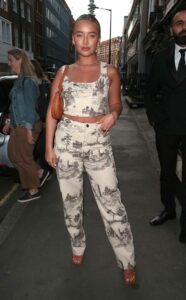 Harley Brash in a White Patterned Ensemble