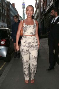 Harley Brash in a White Patterned Ensemble