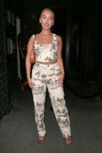 Harley Brash in a White Patterned Ensemble