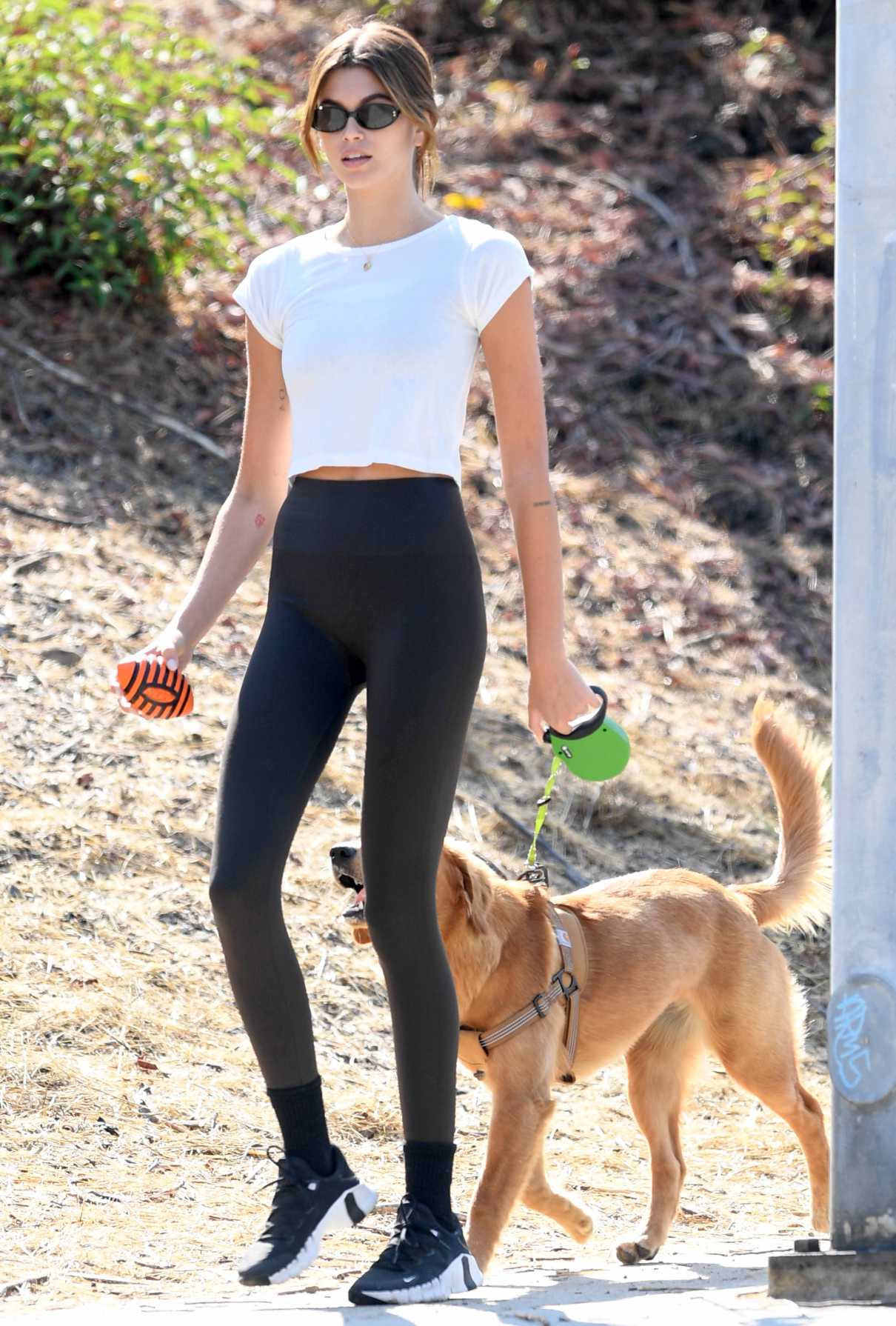 Kaia Gerber in a White Cropped Tee