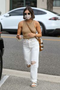 Lucy Hale in a White Ripped Jeans