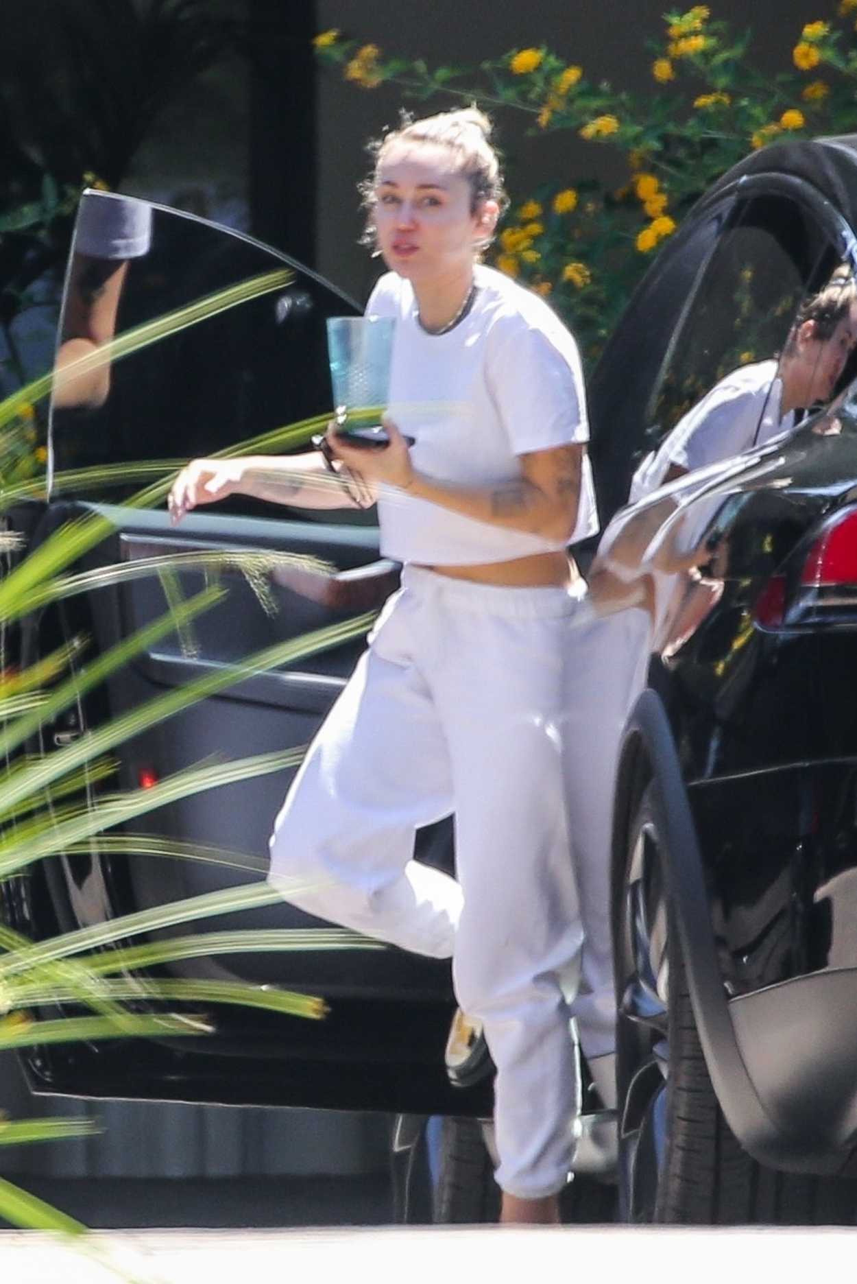 Miley Cyrus in a White Outfit