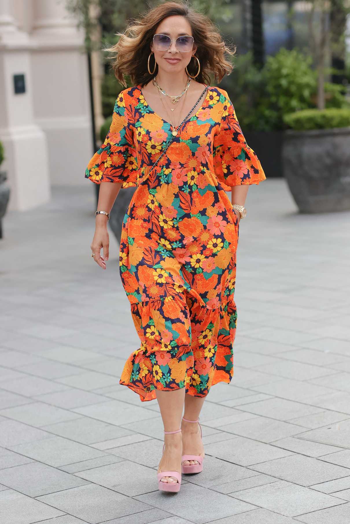Myleene Klass in an Orange Floral Dress