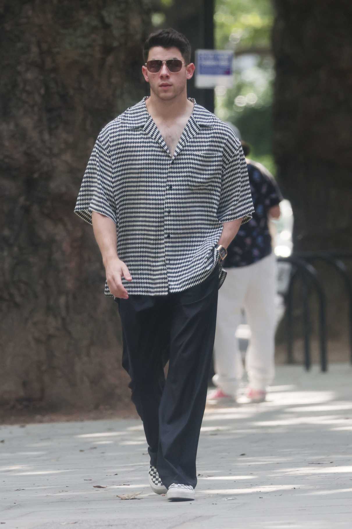 Nick Jonas in a Grey Shirt