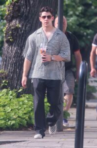 Nick Jonas in a Grey Shirt