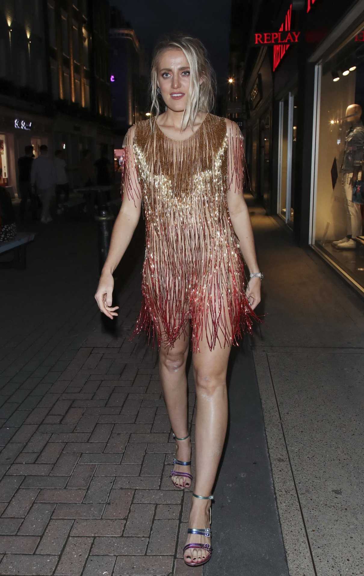 Sophie Tea in a See-Through Mini Dress
