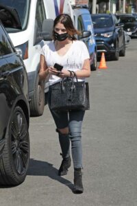 Ashley Benson in a Black Ripped Jeans