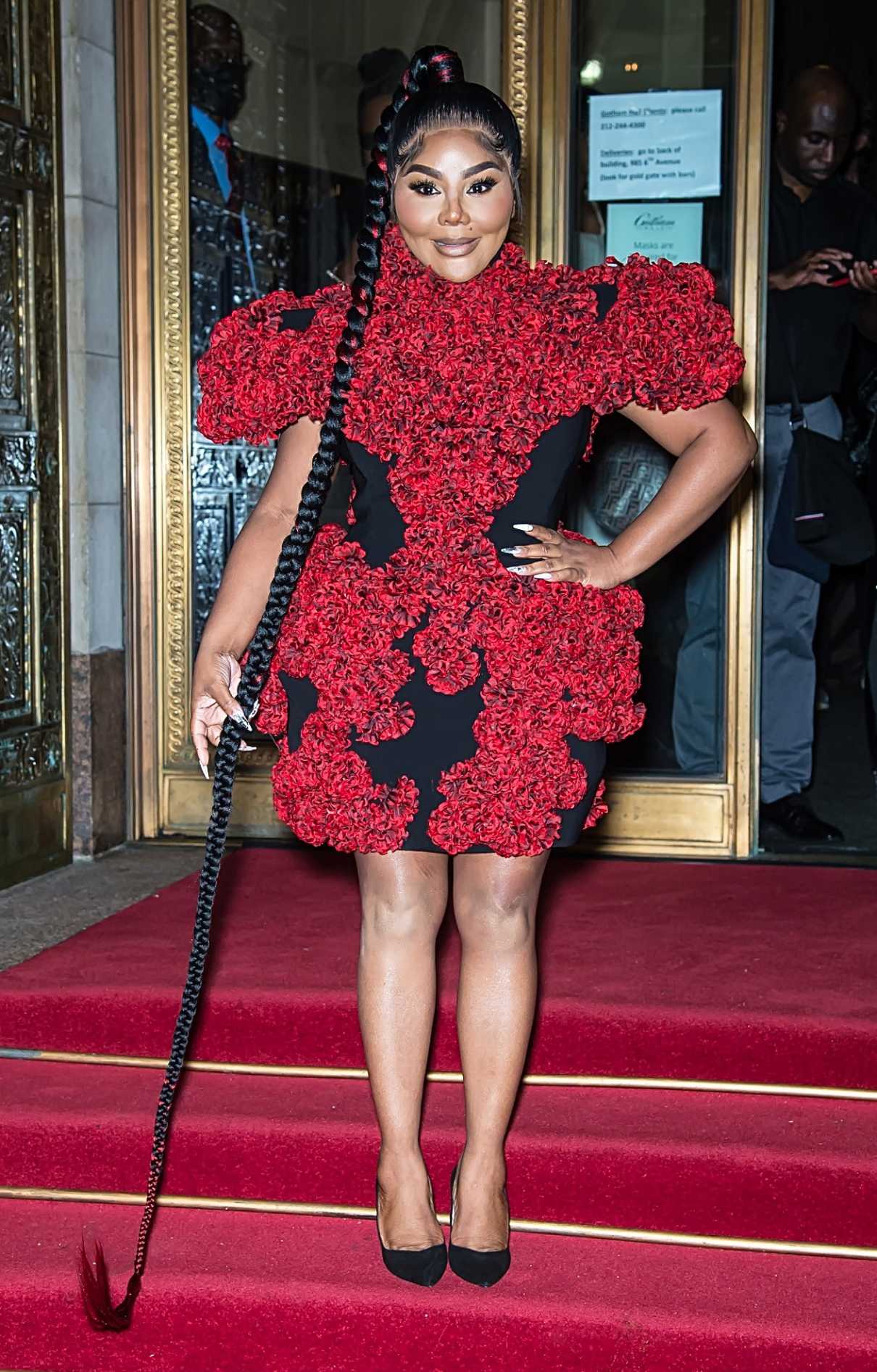 Lil Kim in a Red and Black Floral Dress