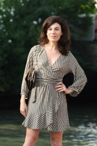 Rosa Palasciano in a Striped Dres