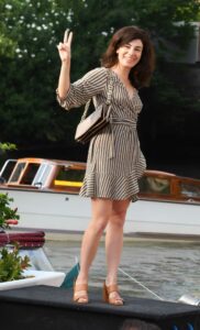 Rosa Palasciano in a Striped Dress