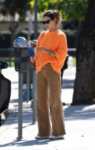 Alessandra Ambrosio in an Orange Sweater