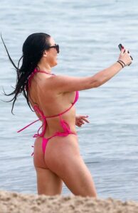 Angela White in a Pink Bikini
