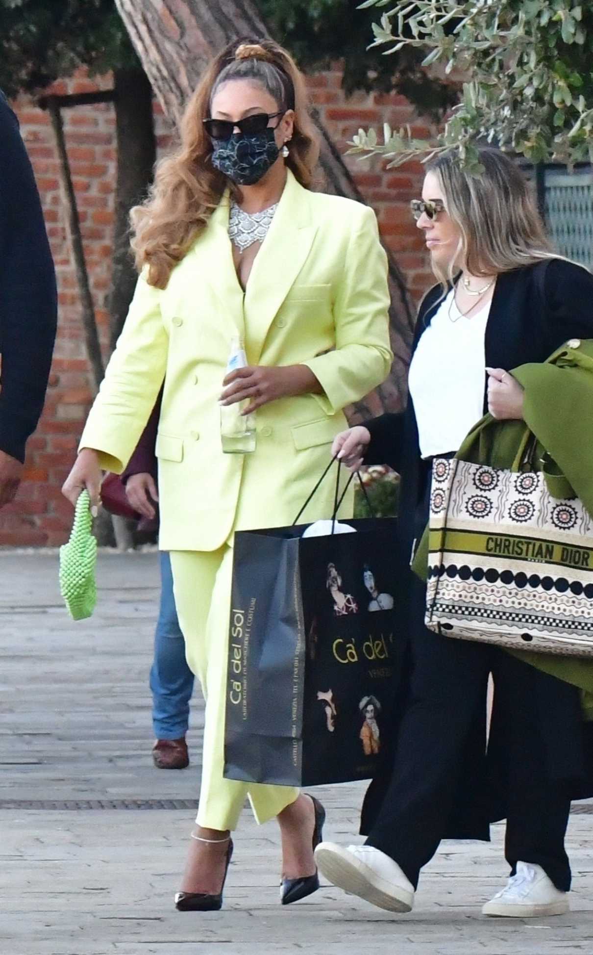 Beyonce in a Yellow Pantsuit