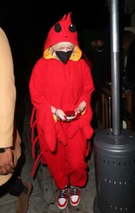 Billie Eilish in a Red Costume