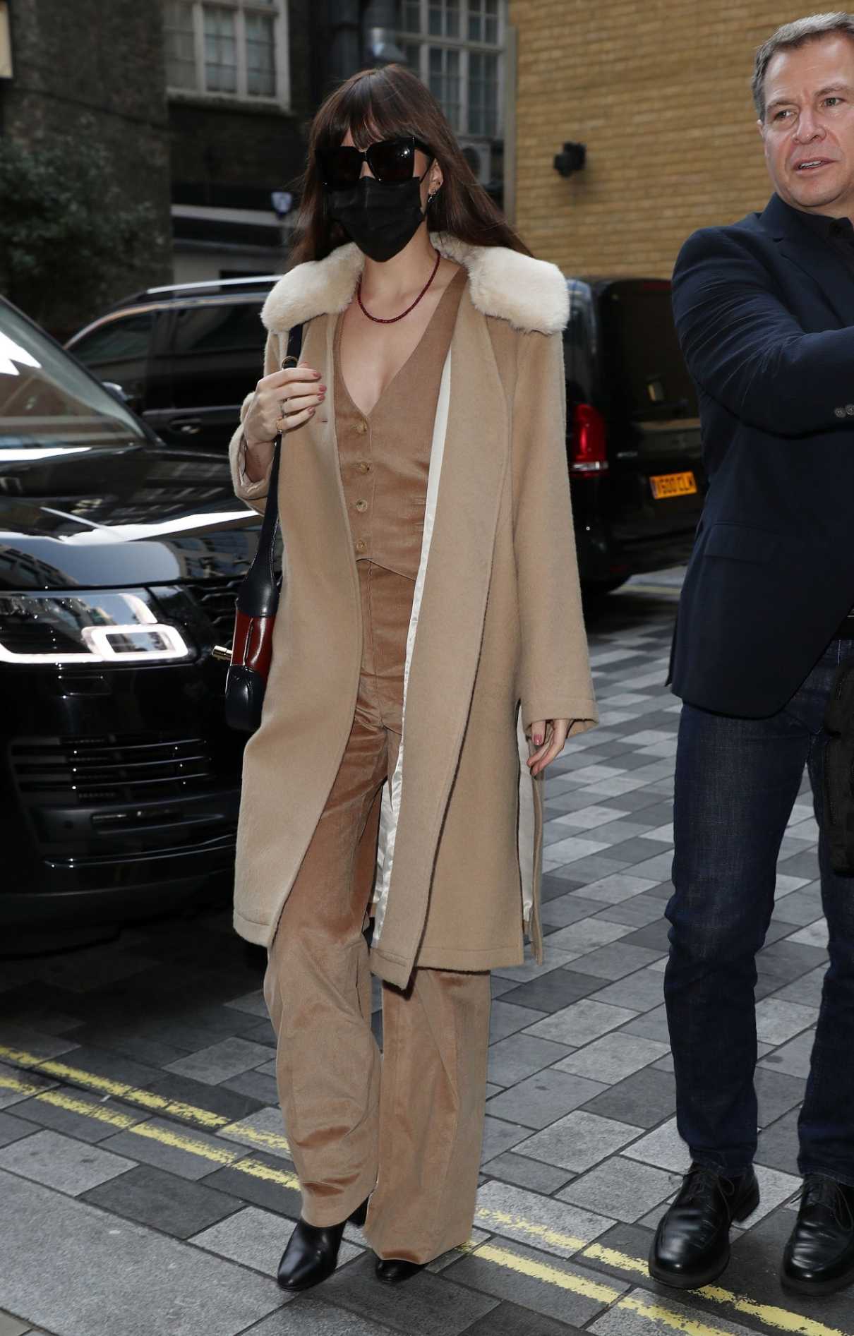 Dakota Johnson in a Beige Coat