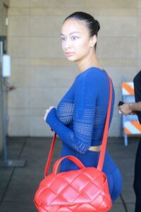 Draya Michele in a Blue Workout Ensemble