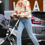 Gigi Hadid in a Blue Jeans Strolling with Her Daughter Khai and Friend Antoni Porowski in Soho, New York 10/23/2021