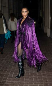 Kat Graham in a Purple Outfit