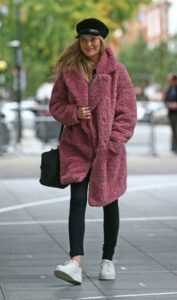 Laura Whitmore in a Pink Faux Fur Coat