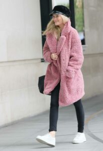 Laura Whitmore in a Pink Faux Fur Coat