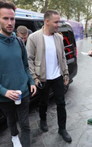 Liam Payne in a Beige Track Jacket