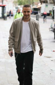 Liam Payne in a Beige Track Jacket