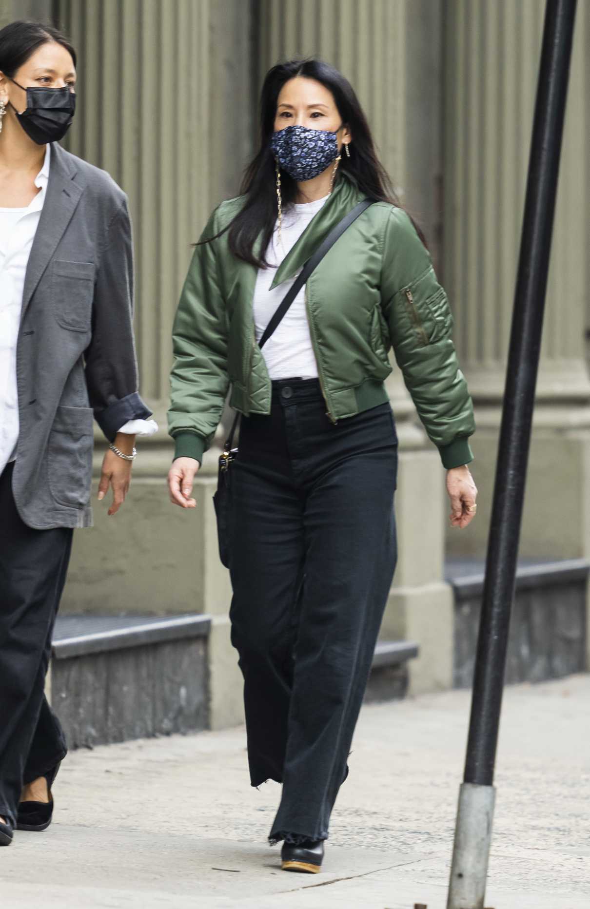 Lucy Liu in a Green Bomber Jacket