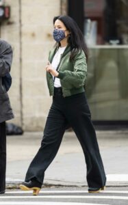 Lucy Liu in a Green Bomber Jacket