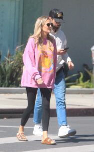 Melissa Ordway in a Pink Sweatshirt