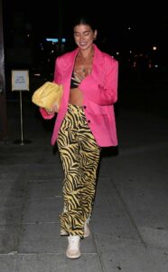 Nicole Williams in a Pink Blazer