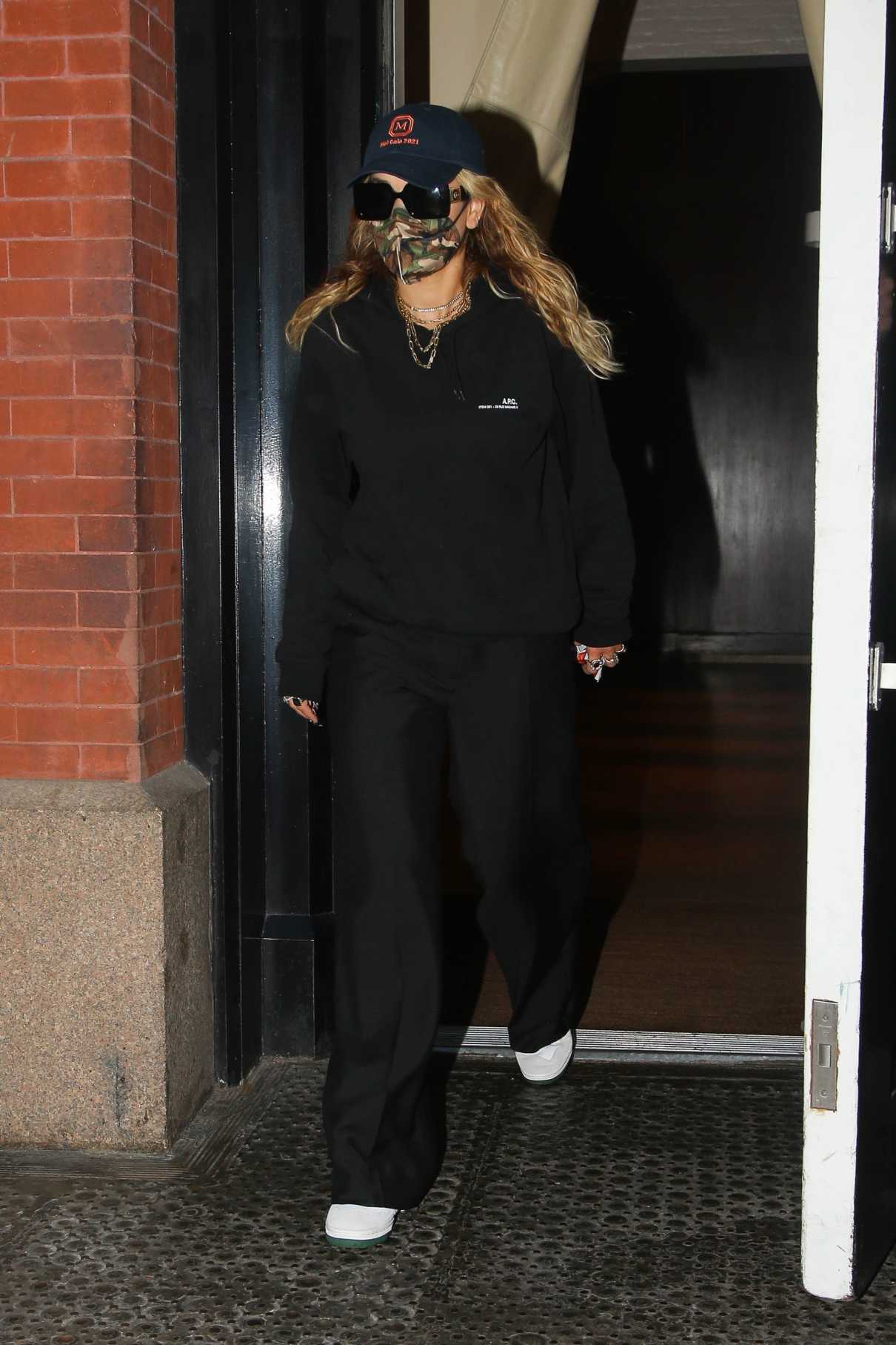 Rita Ora in a Black Outfit