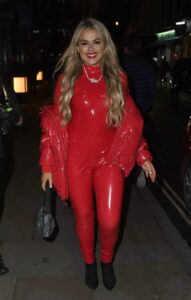 Tallia Storm in a Red Ensemble