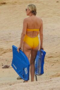 Charlize Theron in a Yellow Swimsuit