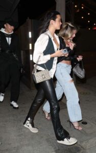 Christine Burke in a Black Leather Pants