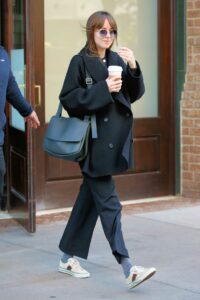 Dakota Johnson in a Black Coat