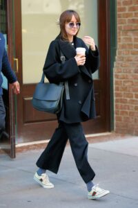 Dakota Johnson in a Black Coat