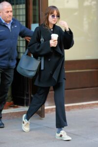 Dakota Johnson in a Black Coat