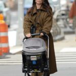 Emily Ratajkowski in a Tan Trench Coat Walks with Her Baby Out in New York 10/30/2021