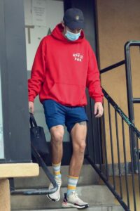 Harry Styles in a Red Hoodie