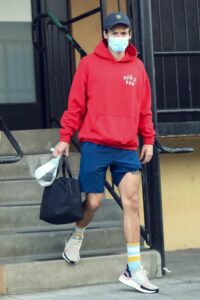 Harry Styles in a Red Hoodie