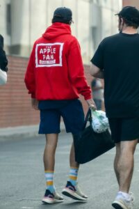 Harry Styles in a Red Hoodie