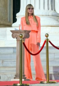 Heidi Klum in an Orange Jumpsuit