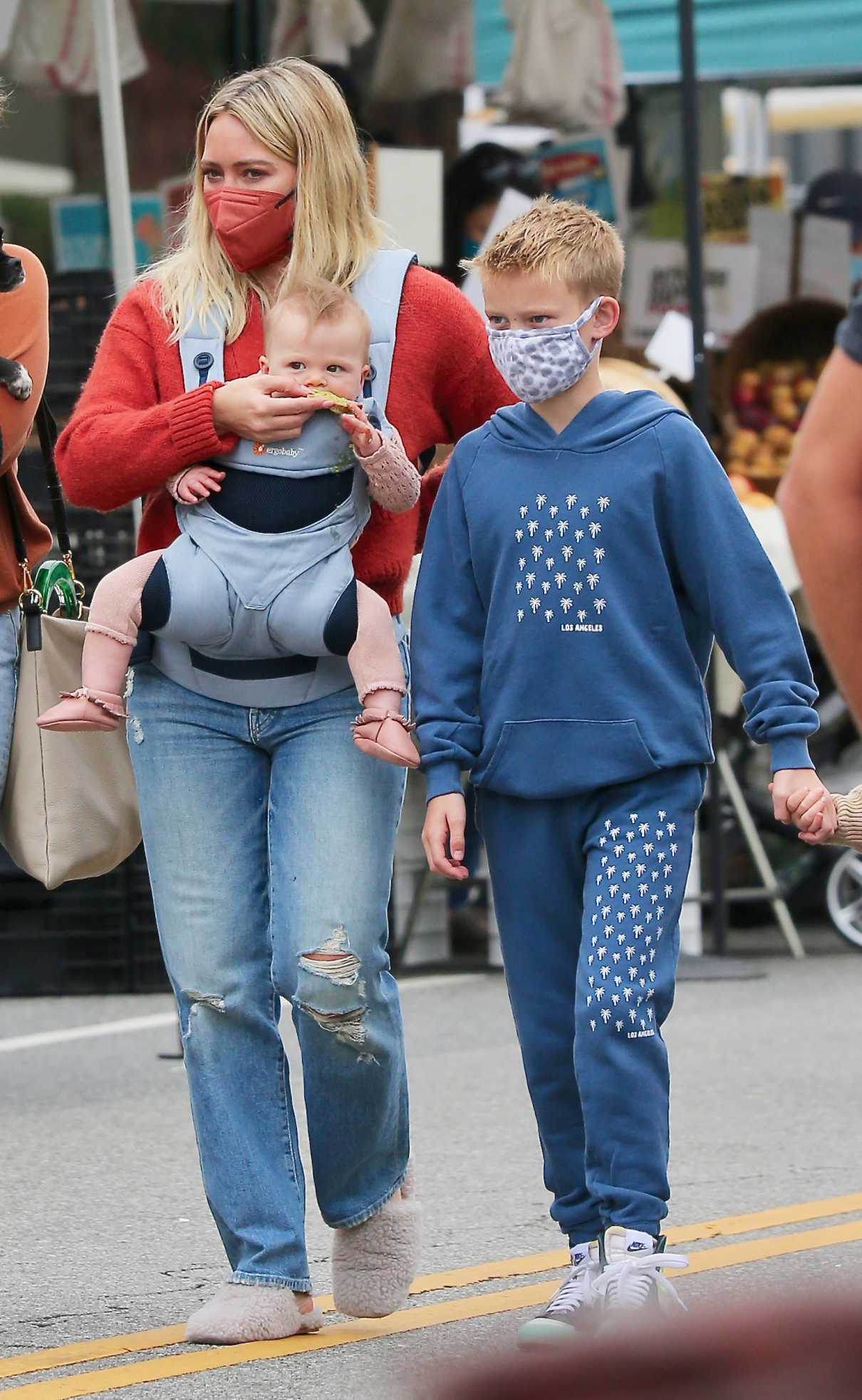 Hilary Duff in a Red Protective Mask