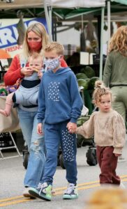 Hilary Duff in a Red Protective Mask