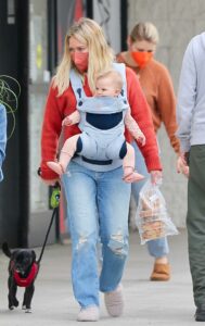 Hilary Duff in a Red Protective Mask