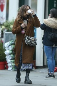 Jenna Coleman in a Tan Coat